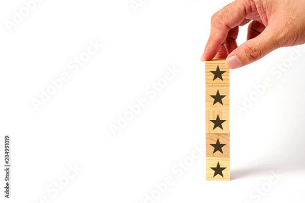 Fototapeta Customer service evaluation and survey concept with wooden block stacked vertically