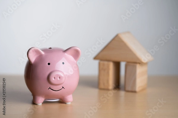 Fototapeta 積み木の家と豚の貯金箱