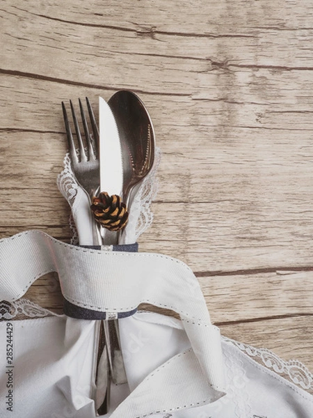 Fototapeta Christmas table place setting. Holidays background