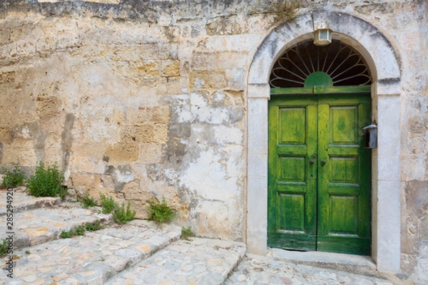 Obraz green doors and old wall
