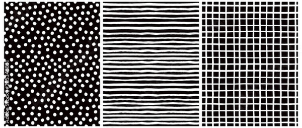 Obraz Ręcznie rysowane dziecinny styl wektor wzór zestaw. Białe poziome paski na czarnym tle. Biała siatka na tylnym układzie. Białe kropki na czarnym tle. Ładny prosty wzór geometryczny.