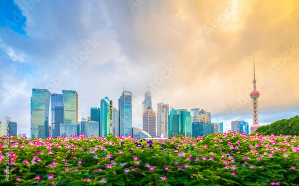 Fototapeta The morning of Lujiazui in Shanghai, China, with the prospect of flower beds