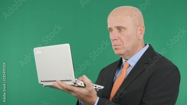 Obraz Businessman Image Read Online Information Using Laptop Connection