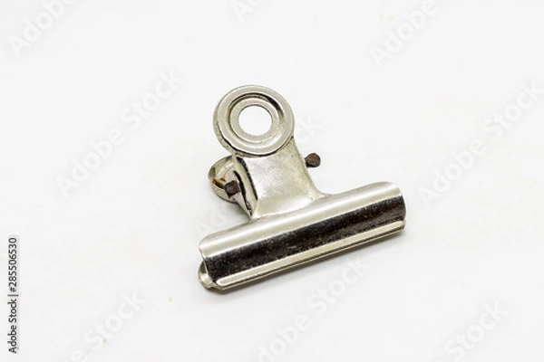 Obraz Paper clip isolated on white background