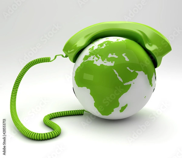 Obraz A global teleommunications concept - green phoneand planet