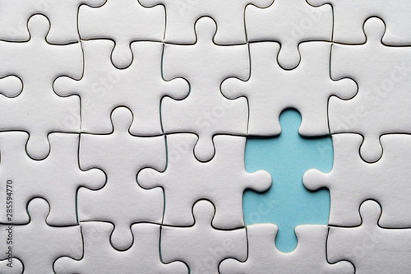 Obraz Jigsaw puzzle with missing piece. Missing puzzle pieces