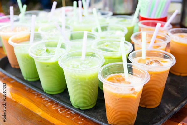 Obraz Colorful soft drink in plastic cup