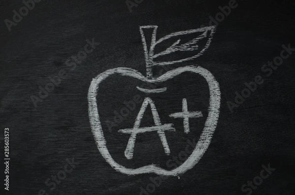 Fototapeta A Plus grad mark with apple 