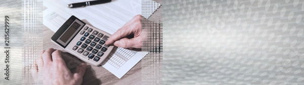 Obraz Hand using calculator, accounting concept; panoramic banner