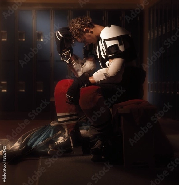 Obraz Hockey Player In Dressing Room