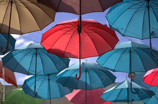 Fototapeta umbrellas on a background of sky