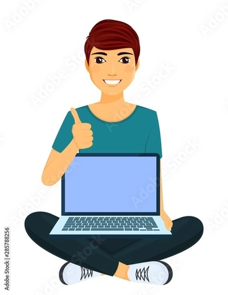 Obraz A young man gestures a big thumbs up. The gesture shows that everything is in order. Work, education and entertainment via the Internet. The guy sits with a laptop on his lap. Flat style on white back
