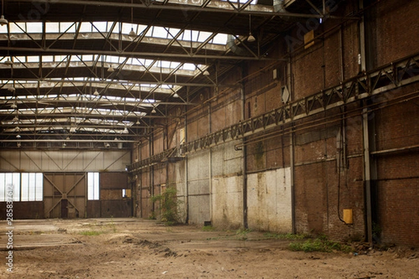 Obraz Abandoned empty old factory workshop interior