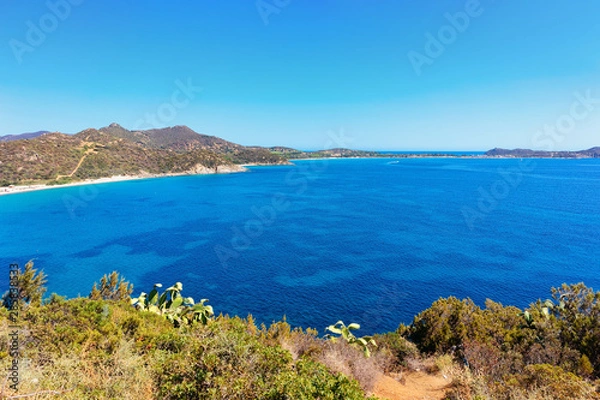 Fototapeta Landscape with beach at Mediterranean Sea in Villasimius with cacti