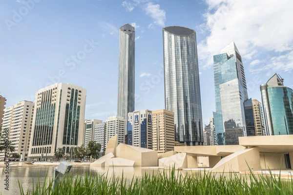Obraz Qasr Al Hosn fort museum in front of skyscrapers in Abu Dhabi, UAE