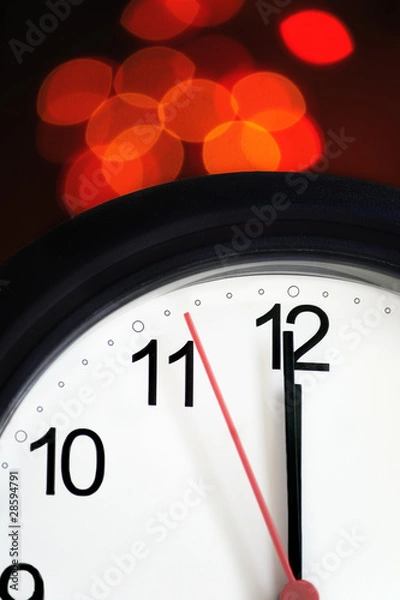 Fototapeta Office clock about to show midnight - few seconds to New Year