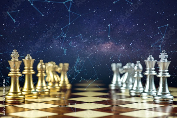 Fototapeta rows of gold and silver chess pieces on a chessboard and abstraction connection line network screen, business strategy concept