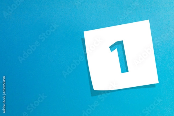 Obraz Note paper with number one on blue background 