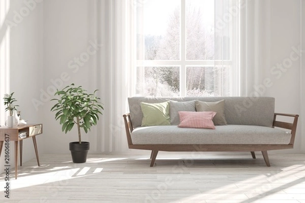 Obraz Stylish room in white color with sofa and winter landscape in window. Scandinavian interior design. 3D illustration