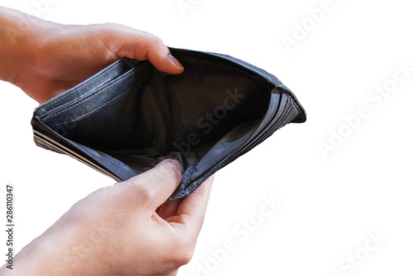 Fototapeta Man hand open an empty wallet on isolated white background with clipping path.Money risk poverty penniless and unemployment concept