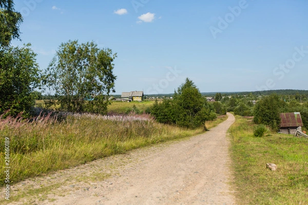 Fototapeta View of in a Russian Nord remote village at summer.
