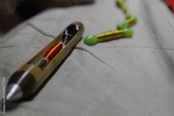 Obraz Hand loom silk sarees weaving process with gold thread