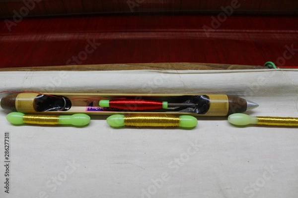 Obraz Hand loom silk sarees weaving process with gold thread