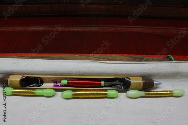 Obraz Hand loom silk sarees weaving process with gold thread