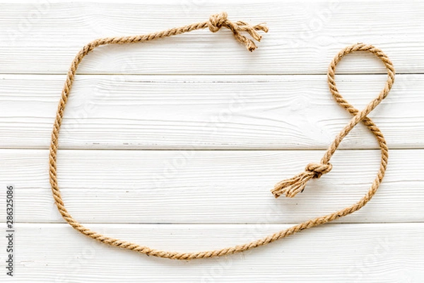 Fototapeta isolated rope mockup on white wooden background top view