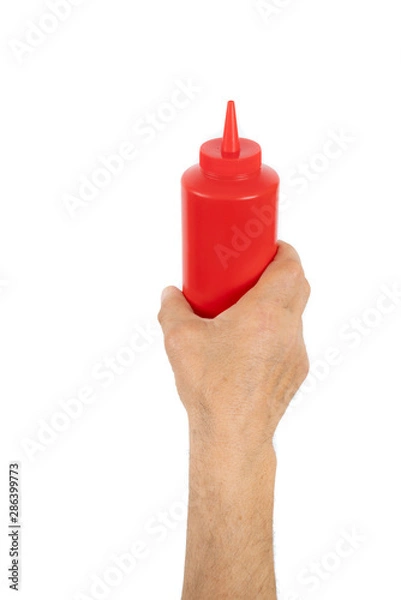 Obraz hand holding plastic ketchup box