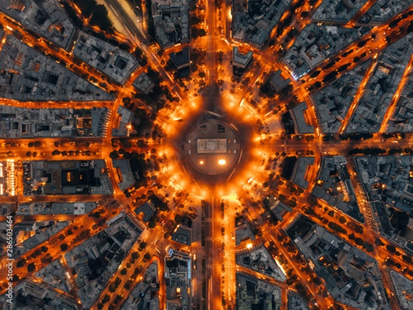 Fototapeta Aerial of the Arc de Triomphe in Paris, France at night