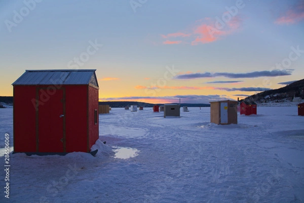 Obraz zachód słońca na zamarzniętym morzu