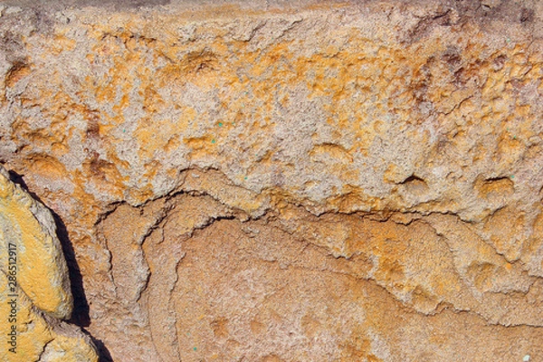 Fototapeta Blurred image of stone wall texture. Abstract texture background, brown colors.