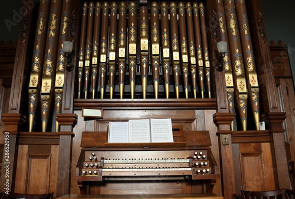 Fototapeta Closeup of an old pipe organ in a church.