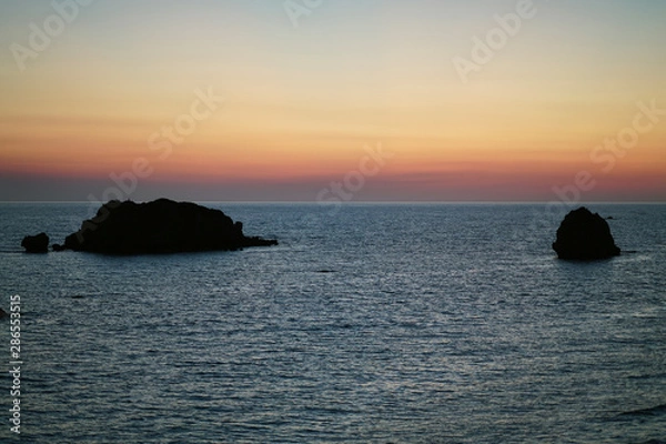 Fototapeta Beautiful sunset seen from the balcony of a tavern in Prasoudi, Corfu