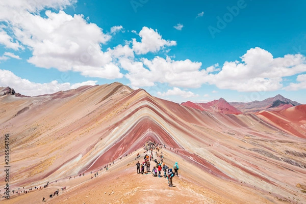 Fototapeta Vinicunca Rainbow Mountain, tourists standing on top of the mountain and admiring the view, Cusco, Peru
