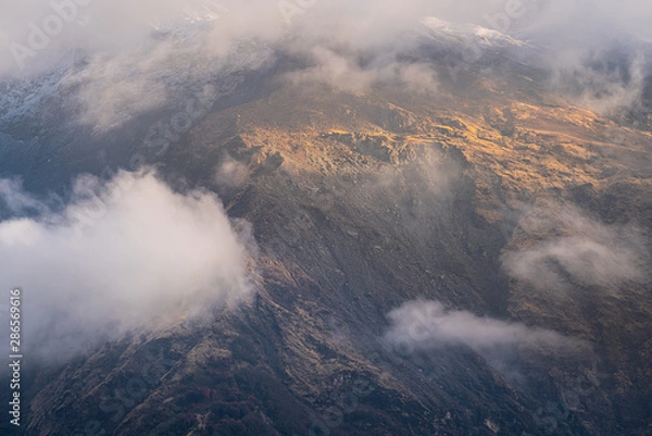 Fototapeta mountain view in himalayas annapurna base camp with cloud and sunlight