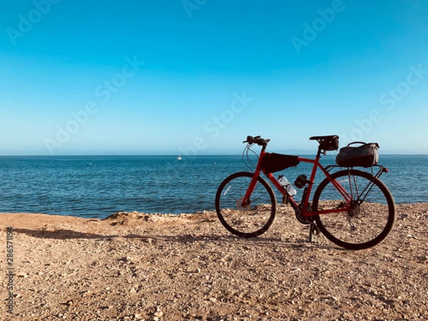Fototapeta A bike ride on the beach of more mesa in Santa Barbara.