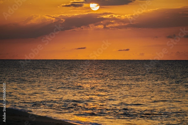 Obraz Orange and blue sunset on the beach in the tropics