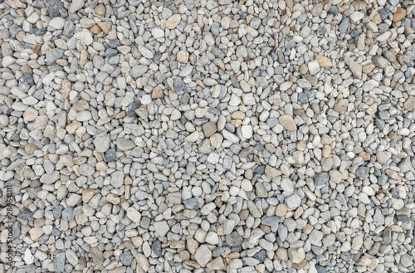 Obraz round stone pebbles texture, little stone material background pattern. 