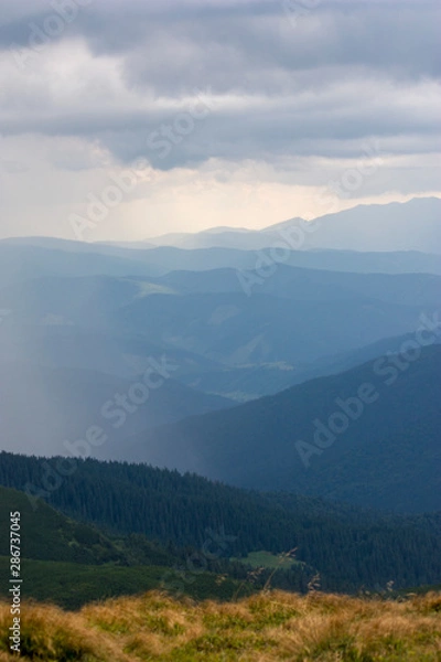 Fototapeta The majestic view of the beautiful mountains. Relaxing travel background. Tourist routes. Carpathians. Ukraine. Europe.