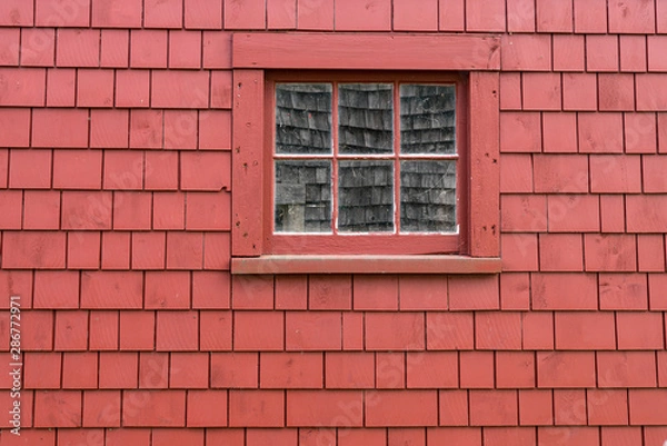 Fototapeta Small Window on the Side of Red Building