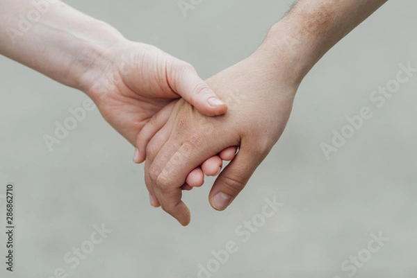 Fototapeta Tender hand in hand