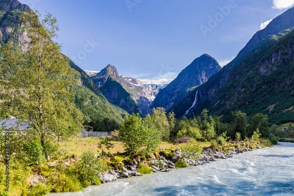 Fototapeta Oldedalen valley with majestic mountains, rivers, waterfalls and impressive Jostedalsbreen glacier in the background in Norway, Scandinavia