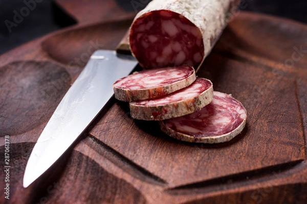 Obraz Sliced salami close up