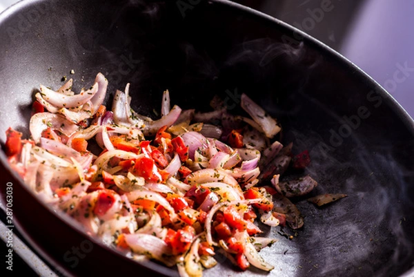 Obraz Cooking vegetables on a wok