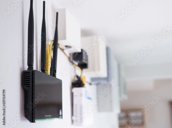 Fototapeta Close up of wireless router on the wall.