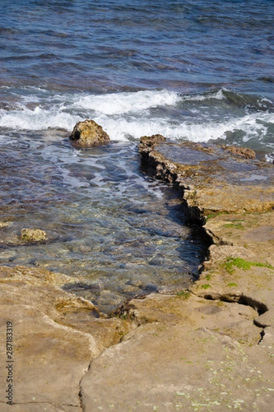 Obraz curved rock on beach