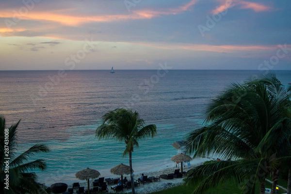 Fototapeta Colorful sunset over caribbean turquoise ocean