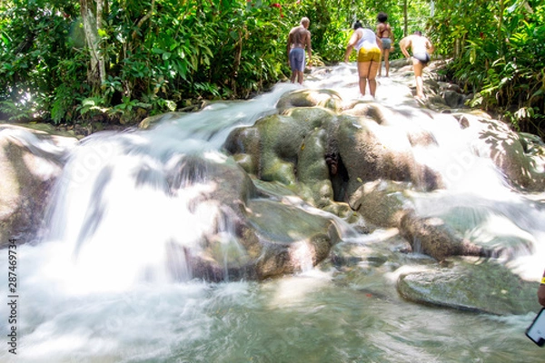 Obraz People walking along famous river fall